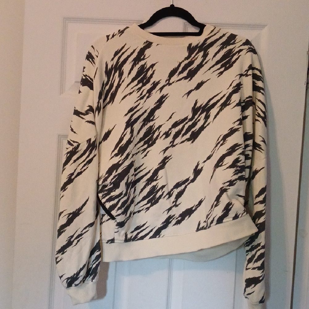 Once We Were Warriors O3W Black and White Patterned Sweatshirt.